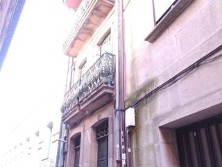 Fachada trasera con balcones